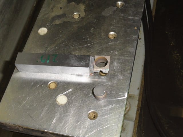 A metal cutting tool with a carbide insert, used in wire EDM process.
