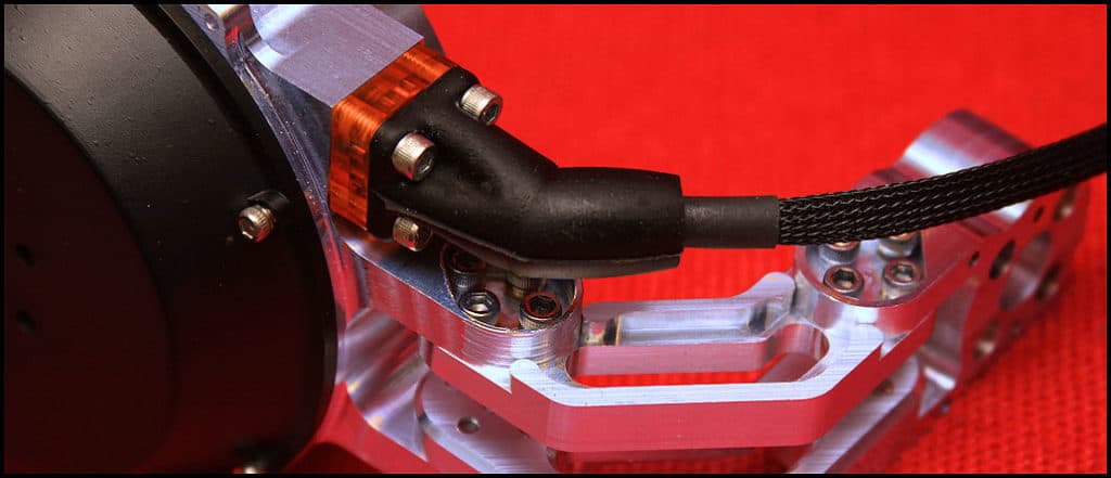 Silver metal weather boot with black plastic and copper-colored components.