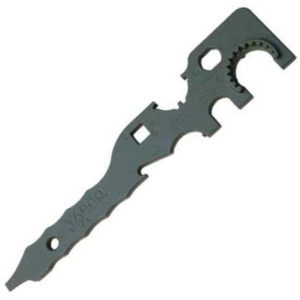 Grey metal tool with jagged edges and central hole.