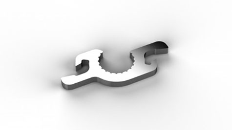 Small intricately cut metal bottle opener with serrated edge.