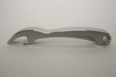 A silver, curved tool with a hole and hook-like shape.