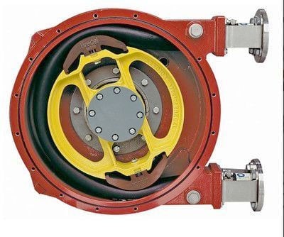 A peristaltic pump with a red outer casing and a yellow and black inner mechanism.