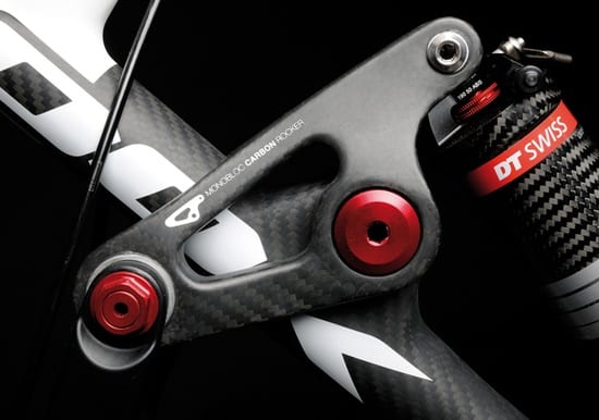 Carbon fiber bicycle component with intricate design and construction details.