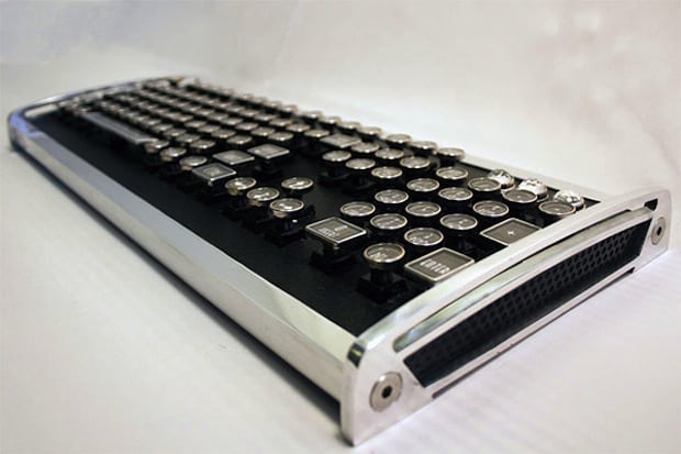 Vintage-style keyboard with black keys and silver accents.