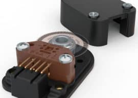 Optical shaft encoder measuring rotational position.