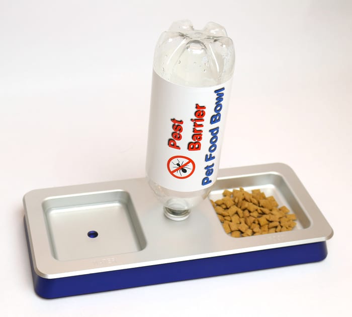 Pest barrier pet food bowl with two compartments.