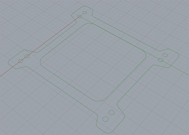 Carb spacer outline with green shape and red grid background.