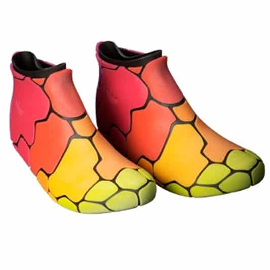Vibrant multicolored shoes with gradient effect and cracked stone pattern.