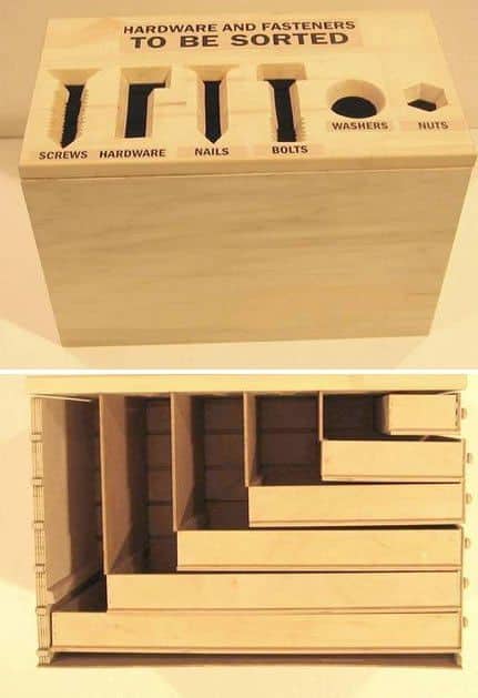 Wooden box with compartments for screws, nails, washers, nuts, bolts.
