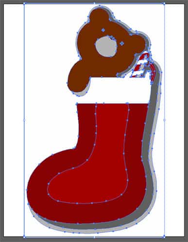 A Christmas stocking in red with white trim and a brown teddy bear.
