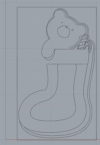 Line drawing of a Christmas stocking with a bear on the toe.