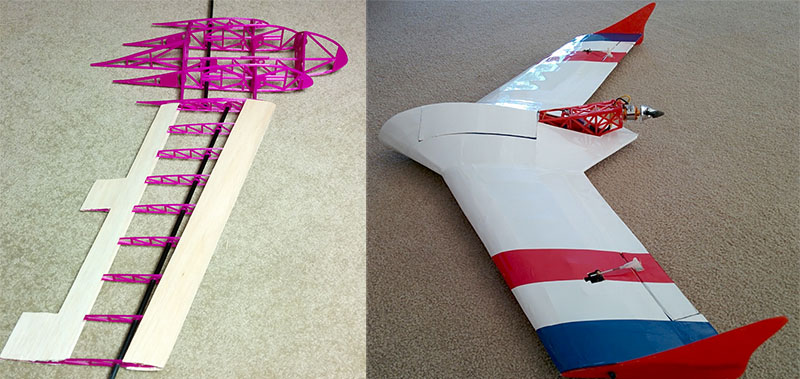 Tail section of an airplane model with parts laid out on a table.