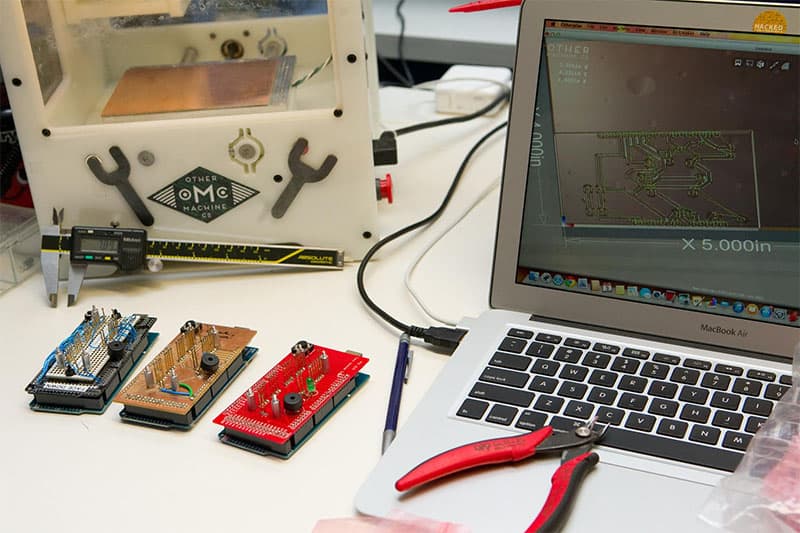 Electronic components and tools, including circuit boards, laptop computer, and 3D printer.