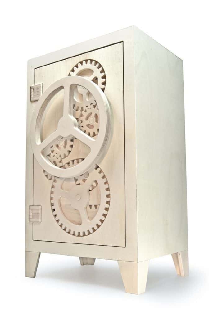 3D-printed wooden cabinet with gear-shaped door handle against a gray background.