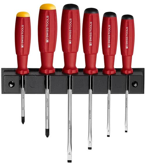 Swiss-style screwdrivers in sizes 1-6 on a gray metal rack.