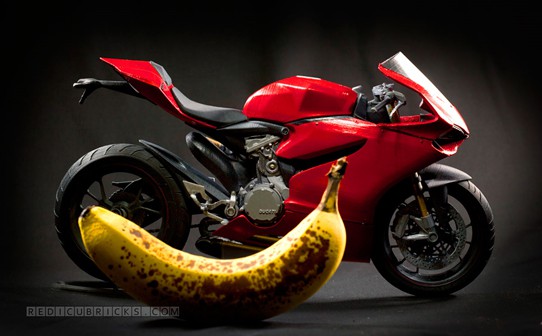Red Ducati motorcycle with banana.