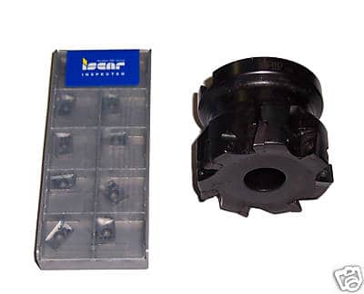 Black metal part with circular hole, blue import label, and white text on gray background.