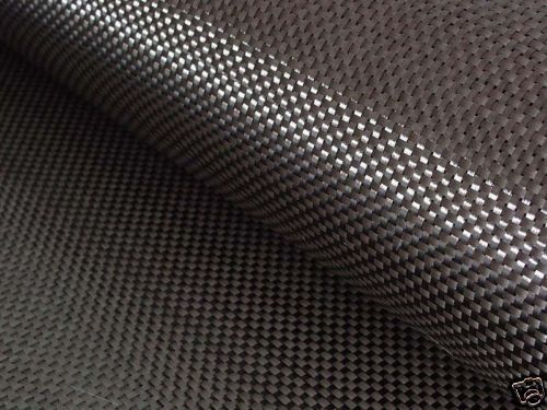 Carbon fiber cloth with an intricate diamond-shaped weave pattern.