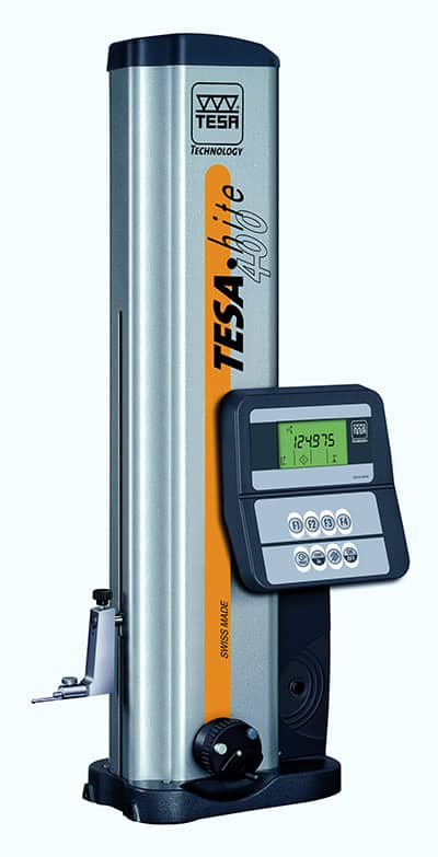 Silver TESA Technology height gage with orange stripe and digital display showing 12:49:75 in green.