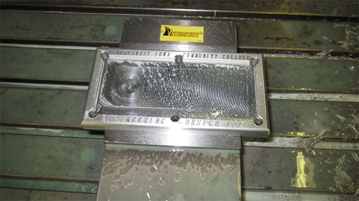 Metal plate with engraved text: SOUTHWEST IOWA COMMUNITY COLLEGE ENGINEERING DESIGN CENTER.