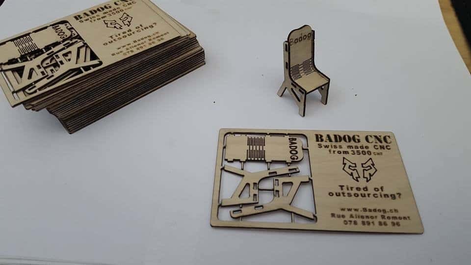 Laser-cut wood business cards for Badog CNC, featuring a chair design.
