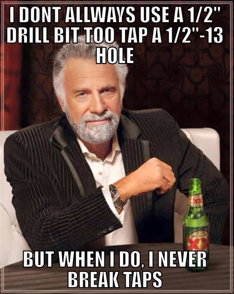 "The Most Interesting Man in the World" holding a drill bit.