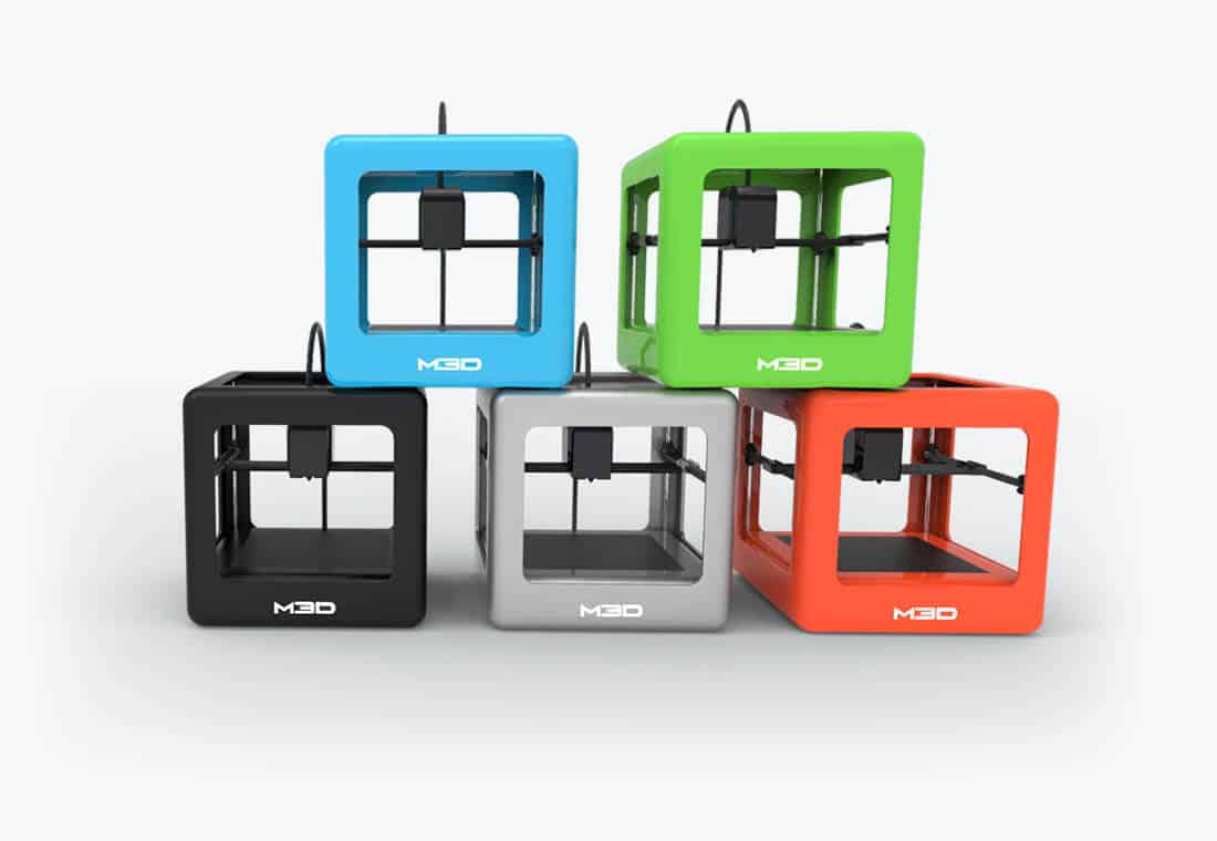 Three-dimensional printers in assorted colors.