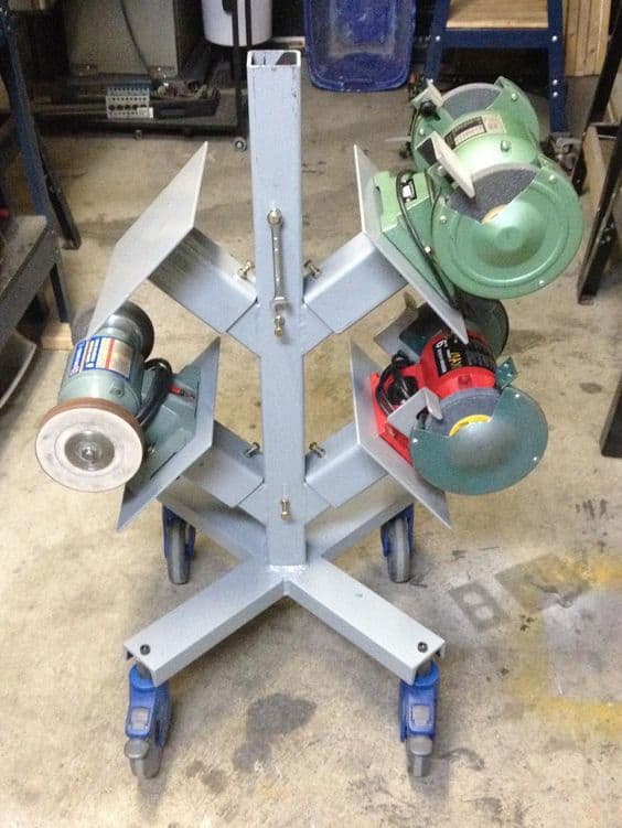 Sturdy gray metal cart with multiple shelves and mounted grinders in various colors.