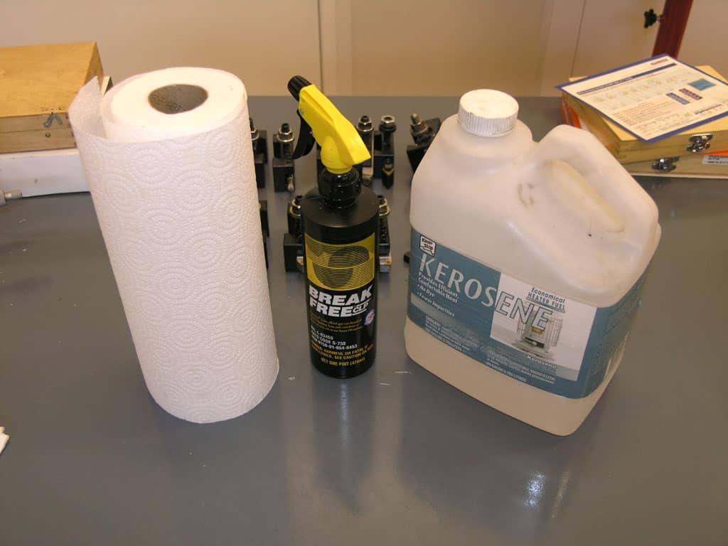 Collection of tools and materials for working with kerosene.