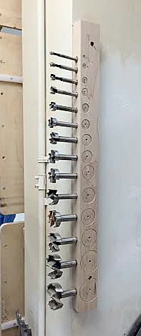 Bolts and screws in a vertical array.