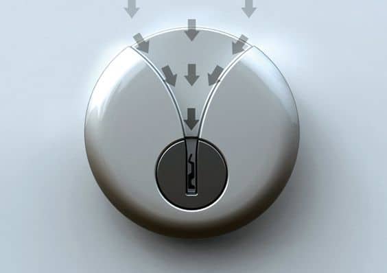 Circular key guide with central hole and directional arrows.