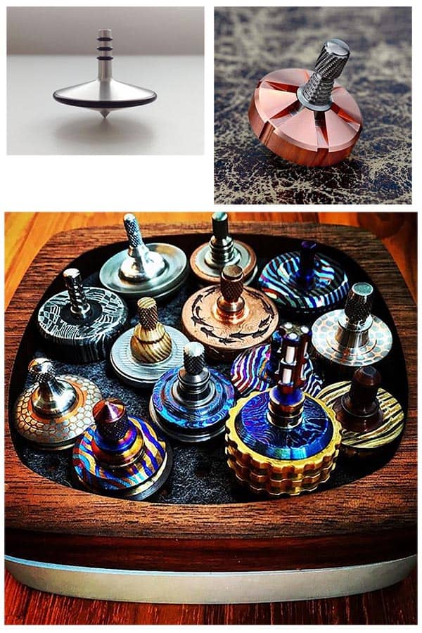 Small spinning tops made from copper, brass, and steel with intricate metal designs.