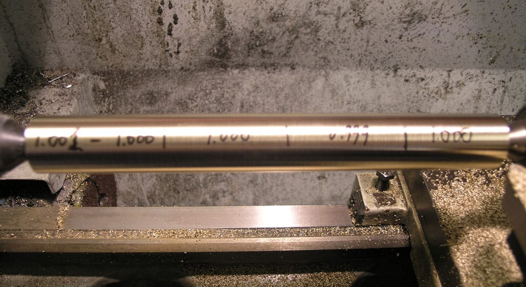 Two metal rods with black markings, positioned horizontally.