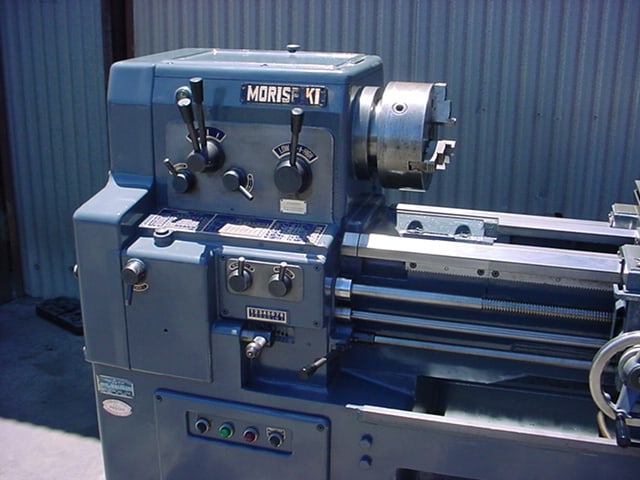 Large blue Moriseiki lathe with prominent brand name on its control panel.