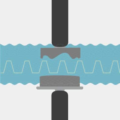 A graphic of the PECM process, showing two metal pieces separated by a wavy blue line.