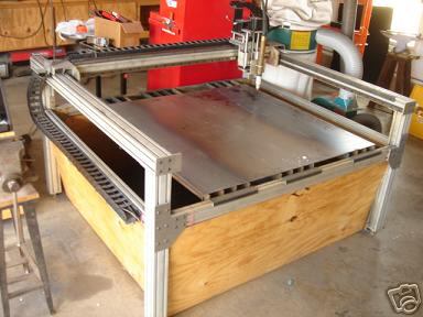 Metal frame with flat surface in machine shop or workshop setting.