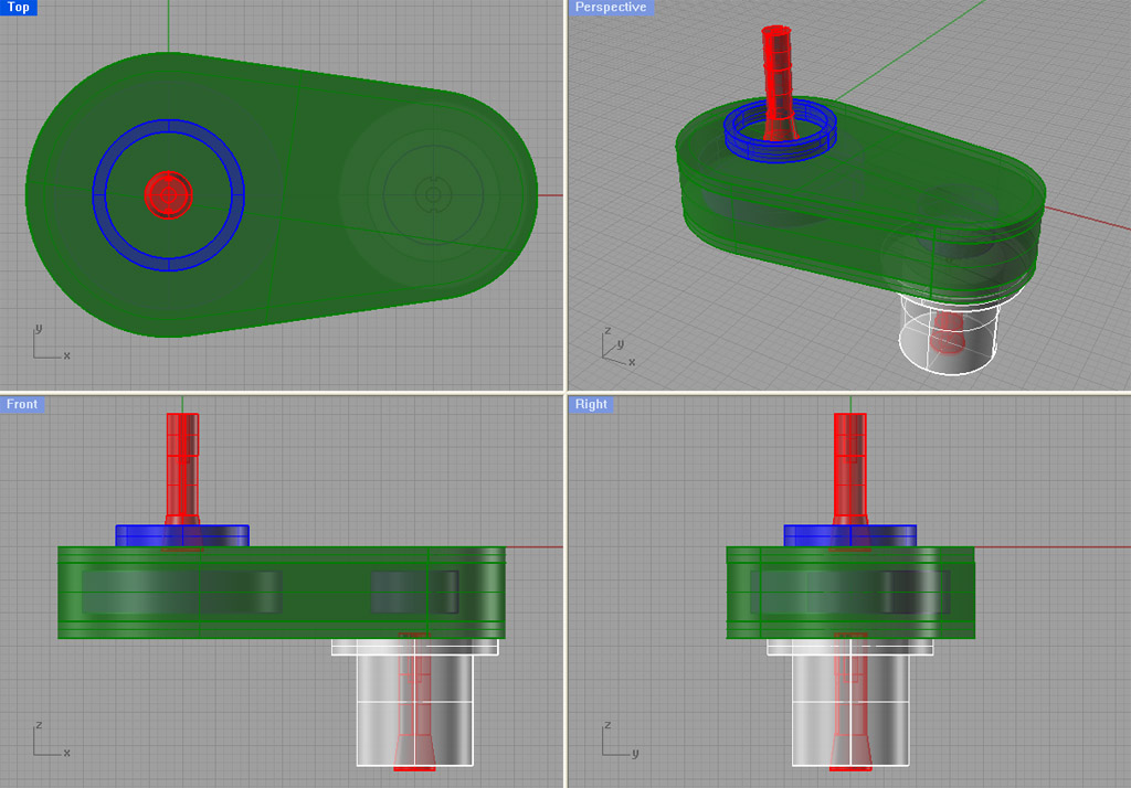 A 3D CAD model of a belt speeder rendered in green with red and blue accents.
