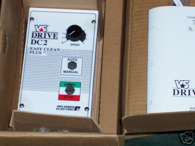 DC controller with white faceplate, black text and buttons, in cardboard box.