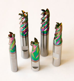 Metal endmills with diamond-like carbon coating on white background.