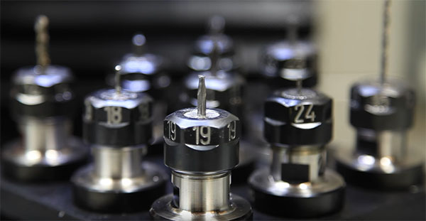 Collet nuts with engraved numbers.