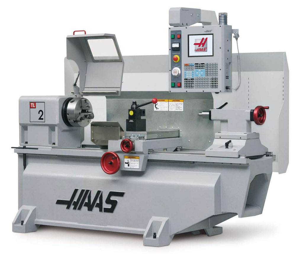 Grey Haas TL-1 lathe with red accents and HAAS logo.