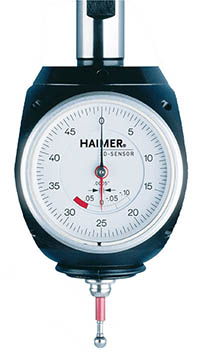 A HAIMER sensor dial indicator with red hand and black numbers on a light gray background.