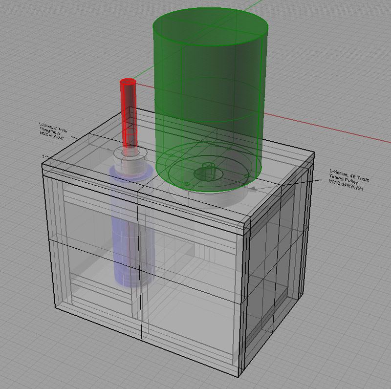 Technical illustration of a mill head with a cylindrical component.
