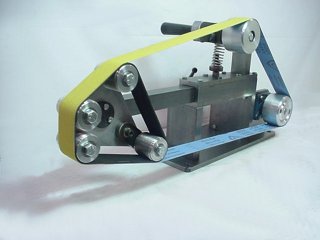 Mechanical device with yellow band and circular components on a white background.