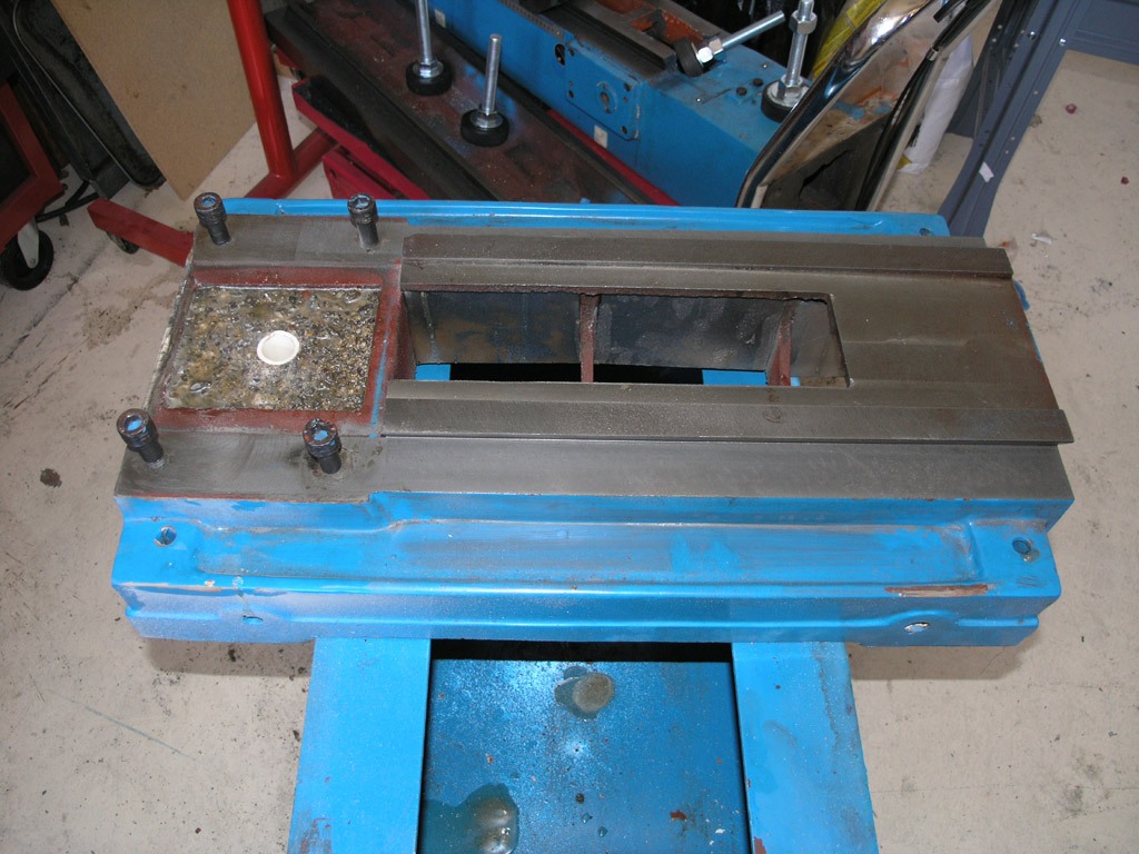 Metal workshop equipment with blue steel frame.
