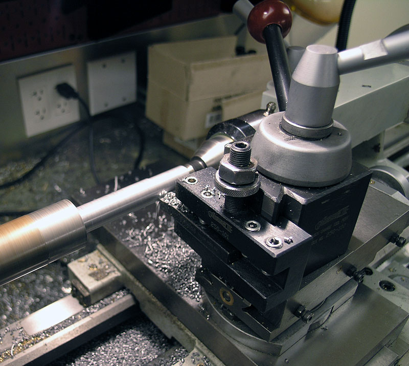 Lathe tool mounted on a machine.
