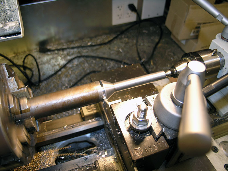 Lathe setup in a machine shop or workshop.