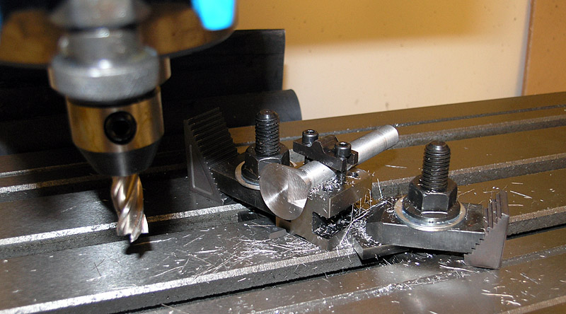 Milling machine cutting tool in use, with metal shavings.