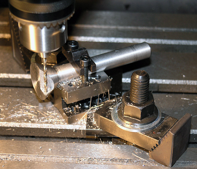Metalworking machine with tools and materials, showcasing precision and craftsmanship.