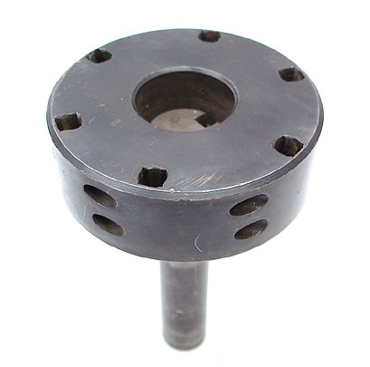 A precision fly cutter with cylindrical body and circular top surface featuring mounting holes.